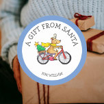 Anpassningsbar Gift från Santa Sticker för barn Runt Klistermärke<br><div class="desc">Anpassa den här söta julklisten med namn och dekorera dina gåvor med den här söta renen som cyklar.</div>