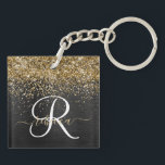 Anpassningsbar Glitter Black Gnistra Monogram<br><div class="desc">Anpassa enkelt den här eleganten av trendig-nyckelkedjan med söt guld mousserande glitter på en svart,  borstad metallisk bakgrund.</div>