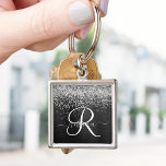 Anpassningsbar Glitter Black Gnistra Monogram Fyrkantig Silverfärgad Nyckelring<br><div class="desc">Anpassa enkelt den här eleganten av trendig-nyckelkedjan med söt silver mousserande glitter på en svart,  borstad metallisk bakgrund.</div>