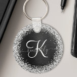 Anpassningsbar Glitter Black Gnistra Monogram Nyckelring<br><div class="desc">Anpassa enkelt den här eleganten av trendig-nyckelkedjan med söt silver mousserande glitter på en svart,  borstad metallisk bakgrund.</div>