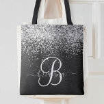 Anpassningsbar Glitter Black Gnistra Monogram Tygkasse<br><div class="desc">Anpassa enkelt trendigets elegant till säckens utformning med söt silver mousserande glitter på en svart,  borstad metallisk bakgrund.</div>