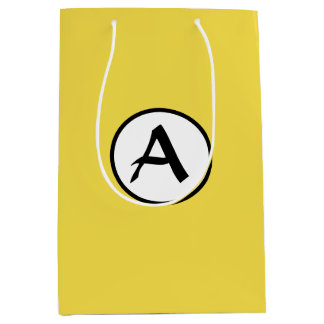 ANPASSNINGSBAR MONOGRAM GULT GIFT BAG