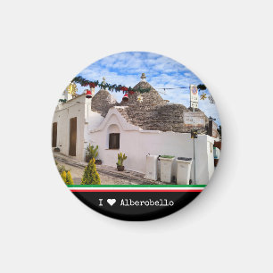 Anpassningsbar text, trauli-hus i Alberobello Magnet
