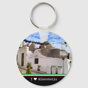 Anpassningsbar text, trauli-hus i Alberobello Nyckelring