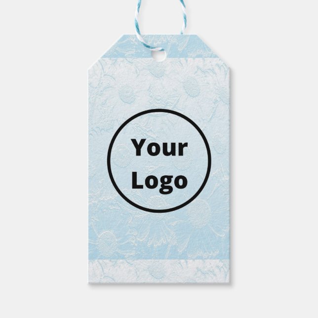 Anpassningsbarnas logotyp, graverad blå blommigt presentetikett (Framsidan)