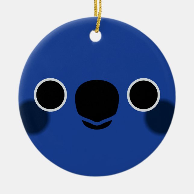 Ansikte i en blå konure julgransprydnad keramik (Framsidan)