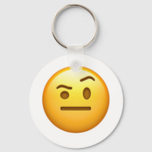 Ansikte med en eyebrow upphöjd - Emoji Nyckelring