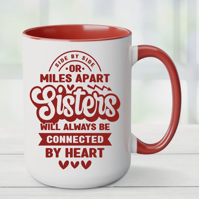 Ansluten av hjärtsyster mugg (Sisters Coffee Mug)