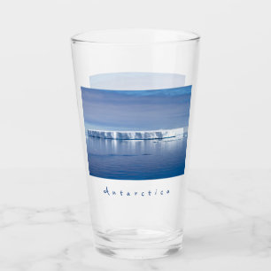 Antarctica iceberg liggande foto med vit text glaskopp