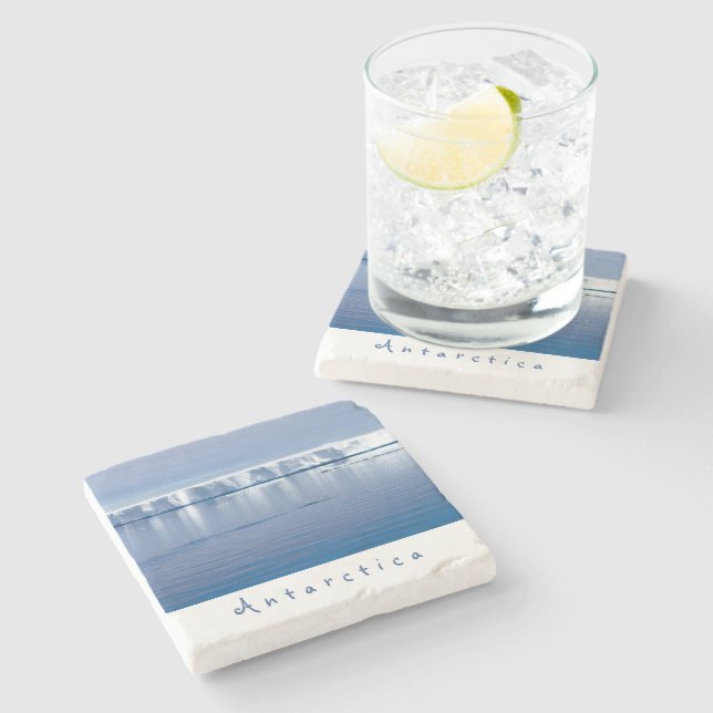 Antarctica iceberg liggande foto med vit text stenunderlägg (Sidan)