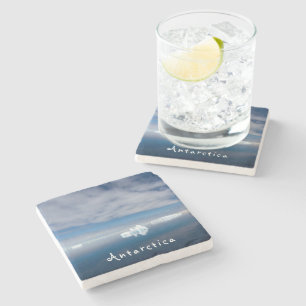 Antarctica liggande flytande isfoto med text stenunderlägg