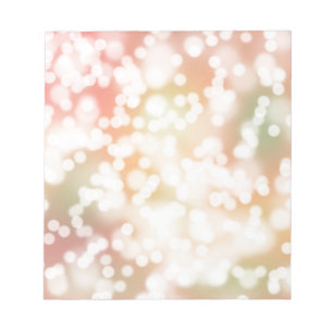 Anteckningar blek-bokeh-bakgrund anteckningsblock
