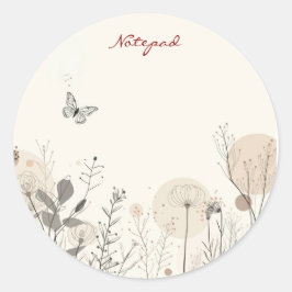 Anteckningsblock dekorerat med vilda växtillustrat runt klistermärke