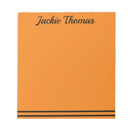 Anteckningsblocket orange och svart anteckningsblock