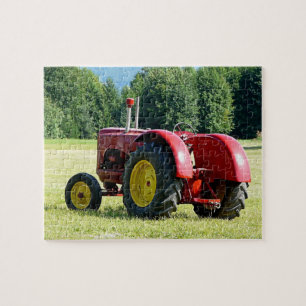 Antik röd och gul traktor i fält pussel