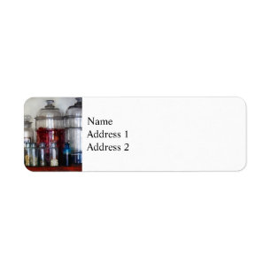 Antika medicin flaskor returadress etikett
