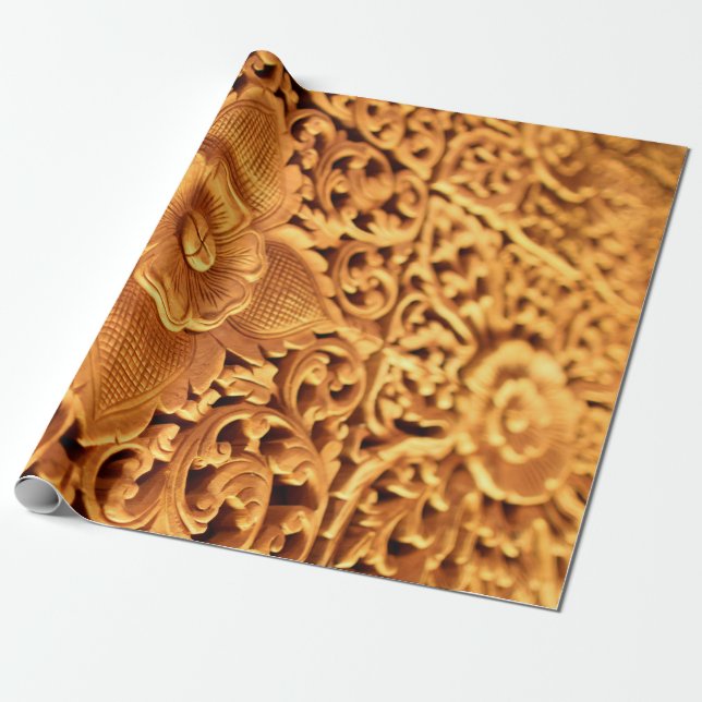 Antikalkonst i guld blommigt nära presentpapper (Utrullad)