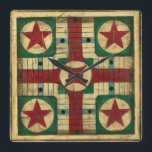 Antique Parcheesi Game Board av Ethan Harper Fyrkantig Klocka<br><div class="desc">En antikt tittar målning baserad på ett Parcheesi-spelbord. Den här målningen av Ethan Harper är häpnadsväckande verklighetstrogen. Du kan nästan tänka dig att spela Parcheesi med dina vänner. Köp ditt exemplar idag!</div>