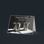 Antique Tin Kopp Brother Grattis på födelsedagen Kort<br><div class="desc">Ett par antika i kopp sitter på ett gammalt bord grovt planker i barackerna vid tidigt 1800-talets fort i Missouri. Det här fotot återges i en vattenfärg stil.</div>