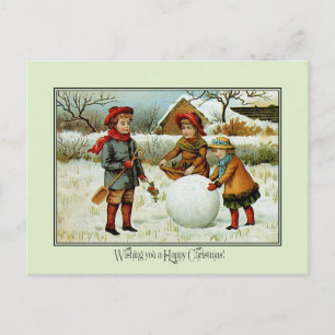 Antique Victorian-julbarn som leker snö Helg Vykort