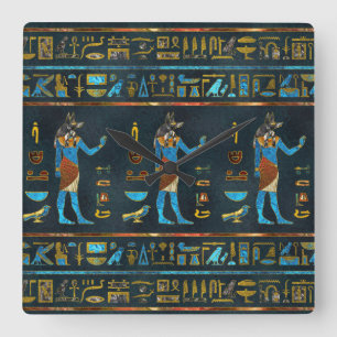 Anubis egyptiskt guld, blått och rött fyrkantig klocka
