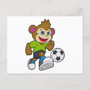 Apa som fotbollsspelare med fotboll vykort