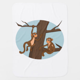 Apor som klättrar upp i tecknadens babyfilt i träd