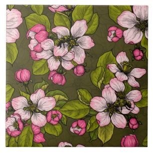 Äppelblommar på mörk grönt kakelplatta