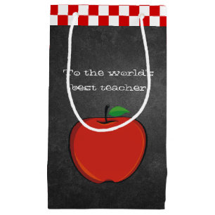 Apple på svart tavlaläraregåvan hänger lös