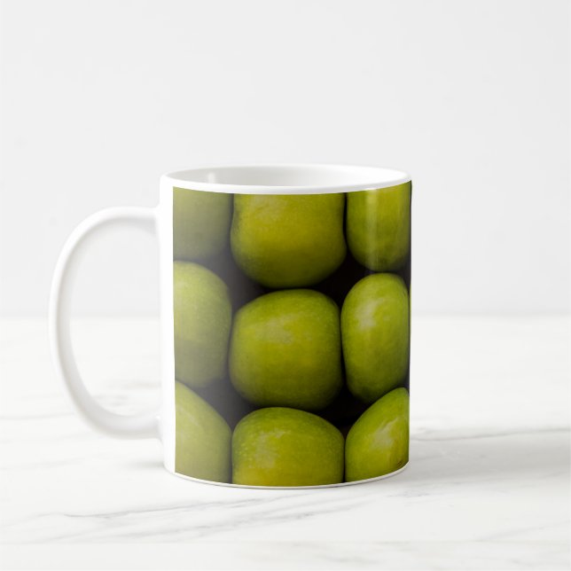 Äpplen, frukter, äpplen av grönt kaffemugg (Vänster)
