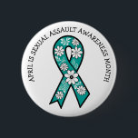 April is Sexual Assault Awareness Month | Teal Knapp<br><div class="desc">A teal ribbon with white and black flowers sexual assault awareness ribbon to ear in April.</div>