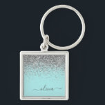 Aqua Blå Teal Silver Glitter Monogram Fyrkantig Silverfärgad Nyckelring<br><div class="desc">Aqua Blå - Teal och Silver Glitter Glänsande Skript Monogram Namn Nyckelringar (Nyckelring). Detta gör den perfekta söta 16-års födelsedag,  bröllop,  bröllopsfest,  årsdag,  baby shower eller möhippa present för någon som älskar glamour lyx och chic stilar.</div>