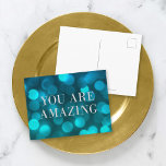 Aqua Blue Bokeh Ljus Faux Silver du är Fantastisk Vykort<br><div class="desc">Chicens motiverade vykort med ord "Du är Fantastisk" i faux-silver mot akvafblått vid ljus mönster. Om du vill lägga till text på kortet klickar du på knappen "Anpassa". *Observera att Zazzle Watermark som visas i zoomförhandsvisningen INTE visas på den färdiga tryckta produkten. © Rosewood and Citrus</div>