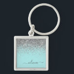 Aqua Blue Teal Silver Glitter Monogram Fyrkantig Silverfärgad Nyckelring<br><div class="desc">Aqua Blue - Teal and Silver Gnistra Glitter Script Monogram Namn nyckelringar (Nyckelring). Det gör perfekten söt 16-årsjubileum,  bröllop,  möhippa,  årsdag,  babydusch eller bachelorette-fest för någon som glam lyxen och chic stilar i kärlek.</div>