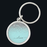 Aqua Blue Teal Silver Glitter Monogram Rund Silverfärgad Nyckelring<br><div class="desc">Aqua Blue - Teal and Silver Gnistra Glitter Script Monogram Namn nyckelringar (Nyckelring). Det gör perfekten söt 16-årsjubileum,  bröllop,  möhippa,  årsdag,  babydusch eller bachelorette-fest för någon som glam lyxen och chic stilar i kärlek.</div>