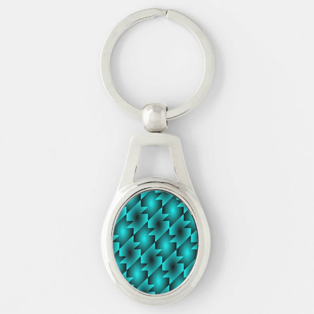 AQUA MÖNSTER DESIGN OVALT SILVERFÄRGAD NYCKELRING (Framsidan)