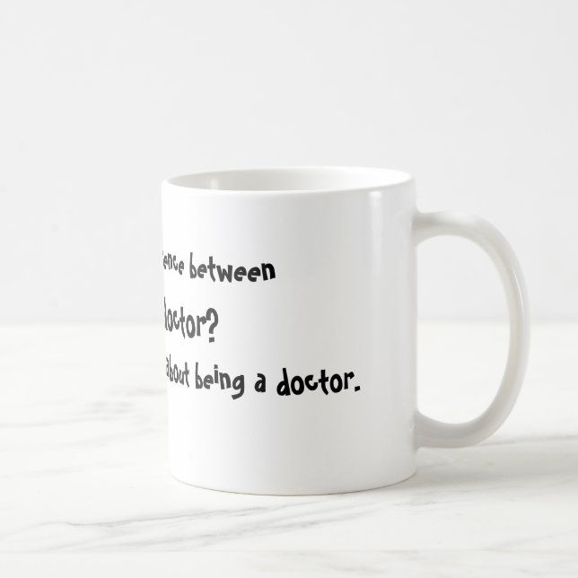 Är vad skillnaden between, guden & en doktor? … kaffemugg (Höger)