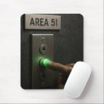 Area 51 Elevator Button Musmatta<br><div class="desc">A dark brown wrinkled alien hand presses a glowing green button labeled 'Area 51' on an elevator panel,  sparking curiosity about the secrets of the location</div>