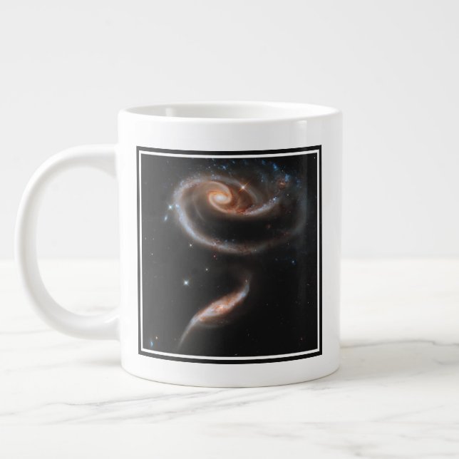 Arp 273 interagerande galaxer i Andromeda. Jumbo Mugg (Vänster)