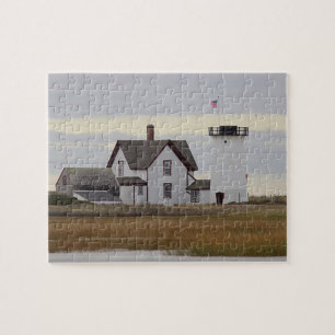 Arrangera hamnfyren pussel