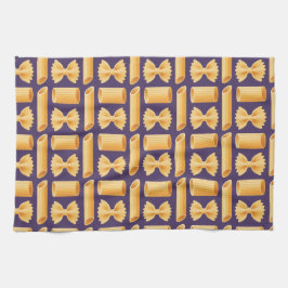 Array of various pasta shapes on a purple kökshandduk