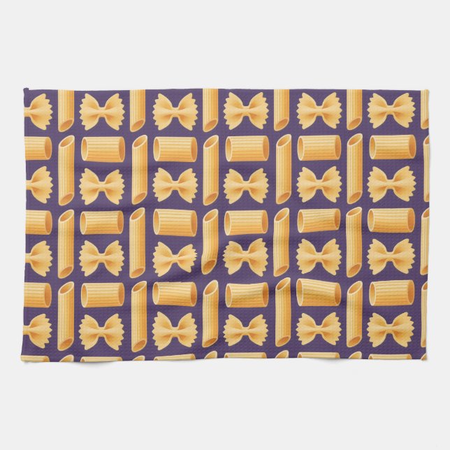 Array of various pasta shapes on a purple kökshandduk (Horisontell)