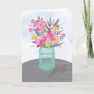 Årsdagsvas med blommor och välsignelser kort