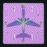 Art Deco Airplane, Violet Purple and Silver Gray Fyrkantig Klocka<br><div class="desc">Clock in an Art Deco inspired concept of a futuristic plane,  in a striped,  silky gradient of lilac to deep violet purple,  with bands of silver gray / grey,  on a pastel lilac and orchid,  Deco background</div>