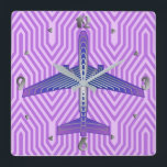 Art Deco Airplane, Violet Purple and Silver Gray Fyrkantig Klocka<br><div class="desc">Clock in an Art Deco inspired concept of a futuristic plane,  in a striped,  silky gradient of lilac to deep violet purple,  with bands of silver gray / grey,  on a pastel lilac and orchid,  Deco background</div>