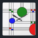 Art Deco Fyrkantig Klocka<br><div class="desc">Den här väggklockan har en nedfläckad-glasruta för konsthugg med svart linjer och röd, blå och grönt fyrkanter och cirklar.</div>