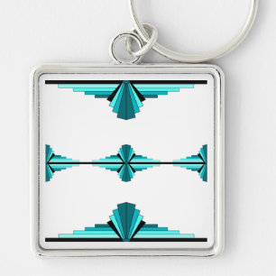 Art deco inslag i teal grönt fyrkantig silverfärgad nyckelring