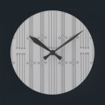 Art Deco Linjer  Rund Klocka<br><div class="desc">Den här klockan har en konsthandledning av lodrät linjer med diamanter och cirklar i silver på fält i grått.</div>