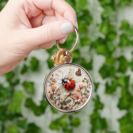 Art Deco Nyckelpiga Blommor Fjäril Rund Silverfärgad Nyckelring