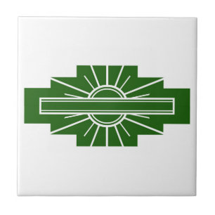 Art deco sol inslag i mörk grönt kakelplatta